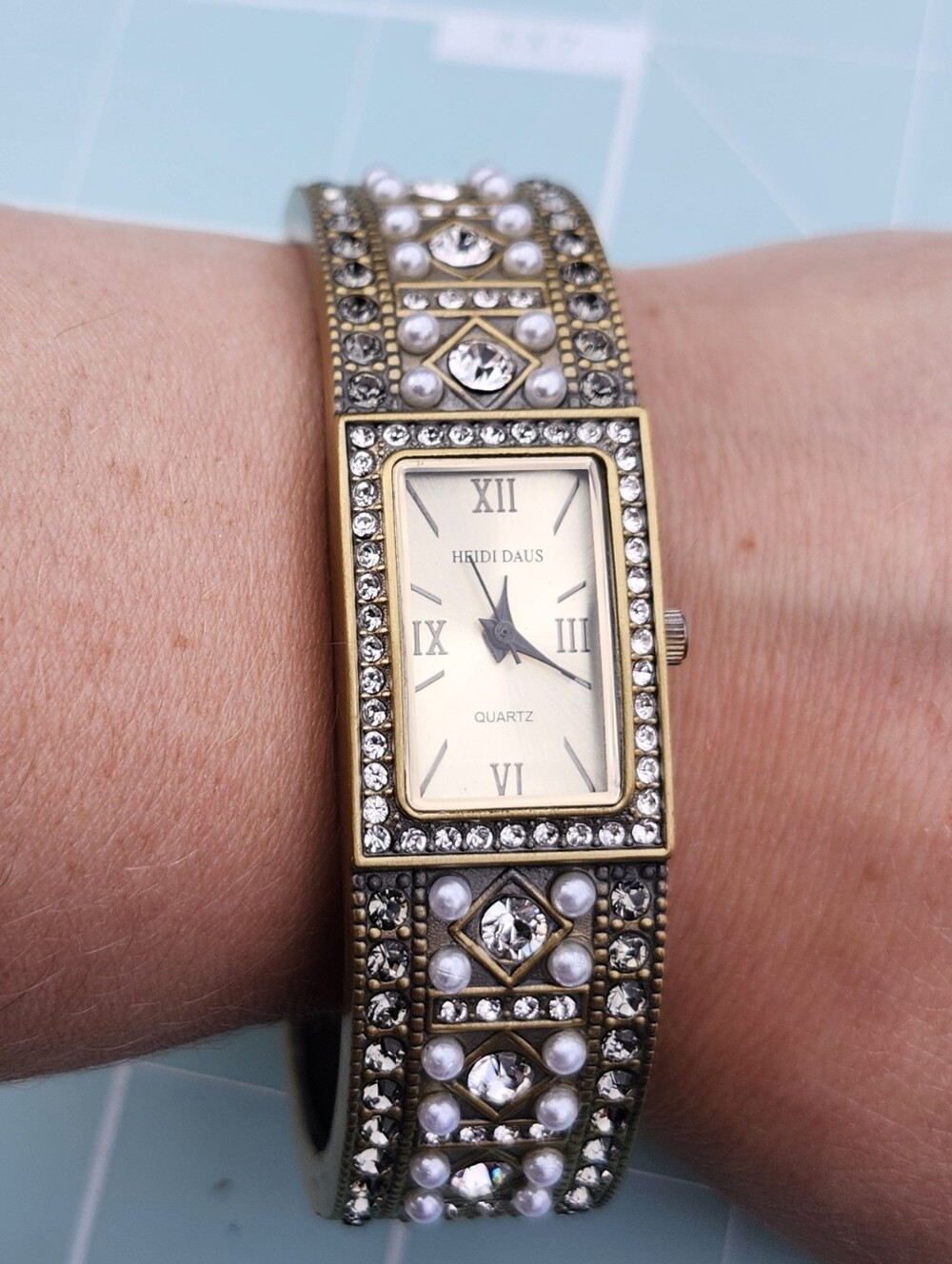 Heidi Daus Gold Tone Pearl & Crystal Bracelet Watch